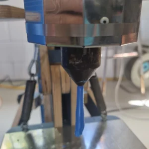 Melted plastic coming out the Injection Moulding Machine