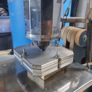 Melted plastic going into the mold