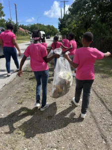 Students from the Sea View Farm Primary School completing the beach cleanup