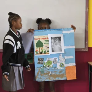 Students of the Sea View Farm Primary School present their poster for session 2