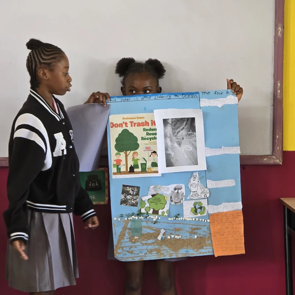 Students of the Sea View Farm Primary School present their poster for session 2