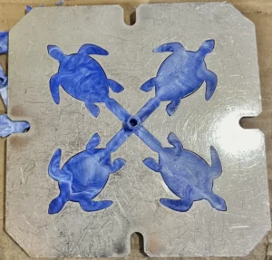 Turtles made from bottle caps in the molds