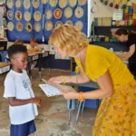 WISH CEO Charlotte presenting the Ocean Lovers Pledge to Island Academy Students